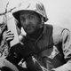 In this handout from the U.S. Marine Corps, Marine Major John W. Antonelli of Lawrence, Mass., gives instructions to his troops on a walkie-talkie radio set, on Iwo Jima, in 1945.